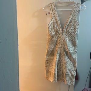 Body con fitted dress, front zipped and open back